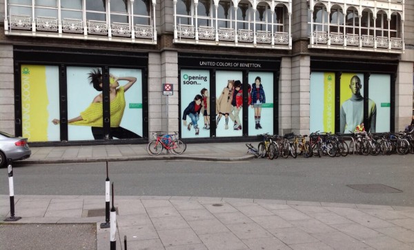 Window Graphic outside Benneton shop at St. Stephens Green depicting happy children playing